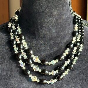 Vintage 3 strand necklace. 50’s-60’s, black faceted and clear aurora borealis.
